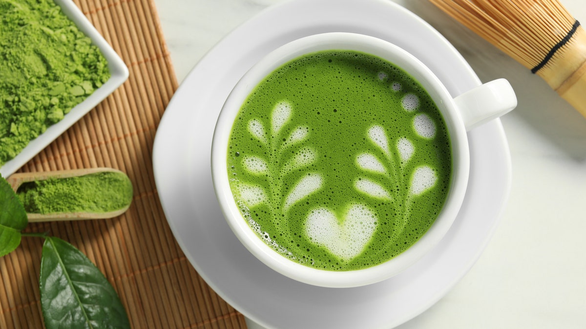 A matcha with a heart design on top