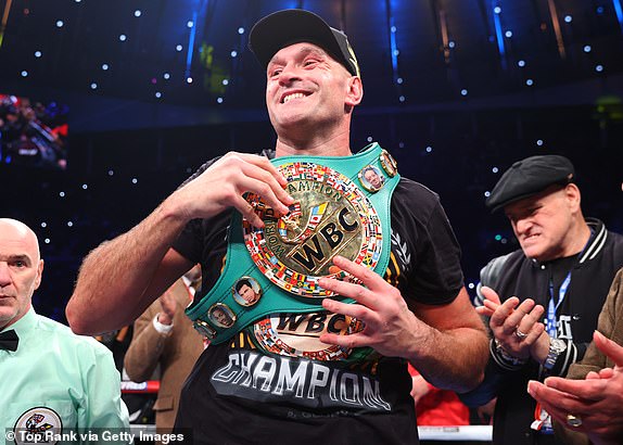 LONDON, ENGLAND - DECEMBER 03: Tyson Fury celebrates after defeating Derek Chisora, during their WBC heavyweight championship fight, at Tottenham Hotspur Stadium on December 03, 2022 in London, England. (Photo by Mikey Williams/Top Rank Inc via Getty Images)