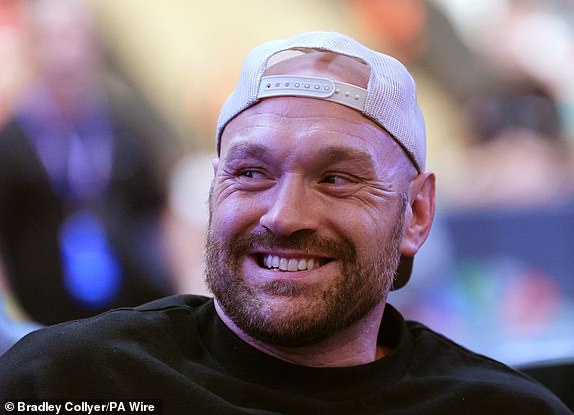 Tyson Fury in the stands at Wembley Stadium, London. Picture date: Saturday September 21, 2024. PA Photo. See PA story BOXING London. Photo credit should read: Bradley Collyer/PA Wire.RESTRICTIONS: Use subject to restrictions. Editorial use only, no commercial use without prior consent from rights holder.