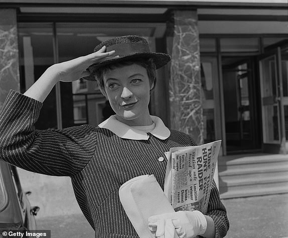 (FILE PHOTO) Actress Dame Maggie Smith Dies at 89 Actress Maggie Smith posing with her hand on her hat, August 27th 1957. (Photo by Evening Standard/Hulton Archive/Getty Images)