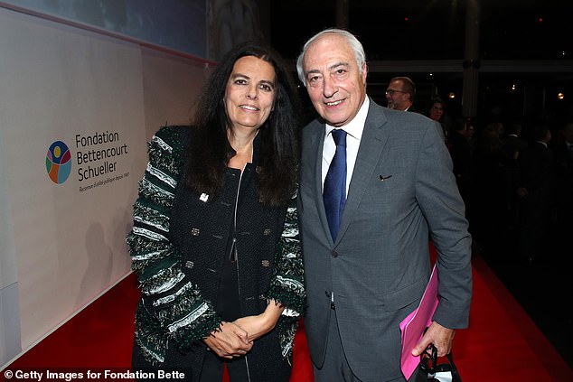 Bettencourt Meyers married Jean-Pierre (pictured together), a former director of Nestle, in 1984 but their marriage caused controversy because her grandfather was accused of siding with Nazis.