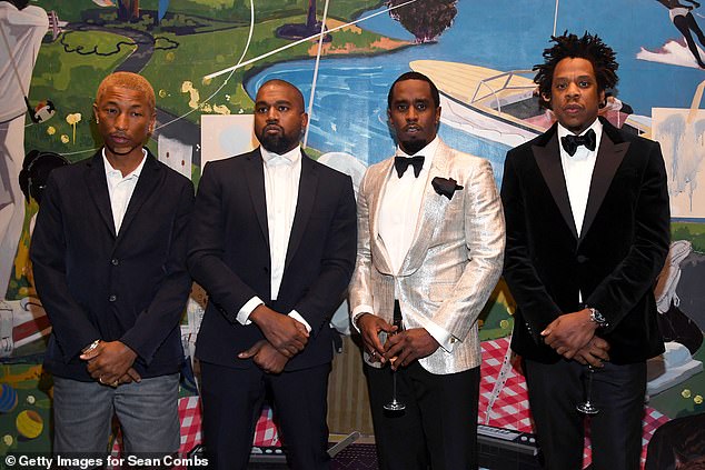 Kanye West, Pharrell Williams and Jay-Z posed with Diddy at the star-studded soiree