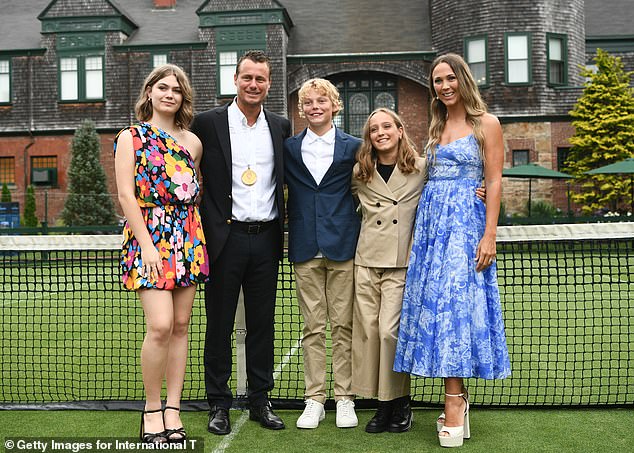 Cruz was born in December 2008 to Australian former world tennis champion Lleyton Hewitt, 43, and his model wife Bec Cartwright. Pictured: Lleyton and Bec with their three children