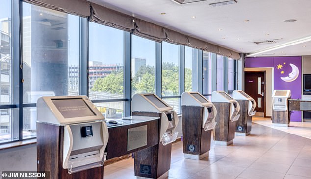 Premier Inn Gatwick North is easily accessible from the Gatwick railway station - just hop on the robot shuttle train, reveals Ted. Pictured above is the hotel's self-check-in area