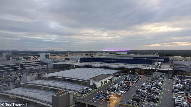 Ted notes that 'beyond the hum-drum airport buildings' beneath his room is 'the mesmerising West Sussex countryside' and (to the left), the runway