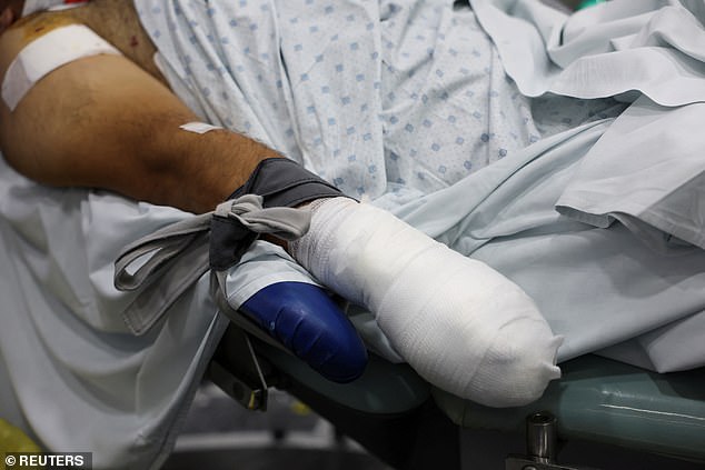 An injured man undergoes an operation, following pager detonations across Lebanon, at a hospital in Beirut, Lebanon September 18, 2024