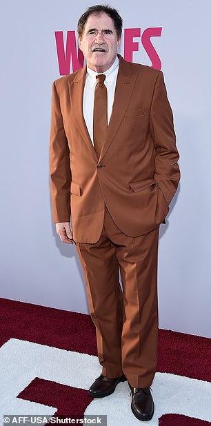 Richard Kind was dressed for the event wearing a brown-colored suit as well as a matching tie