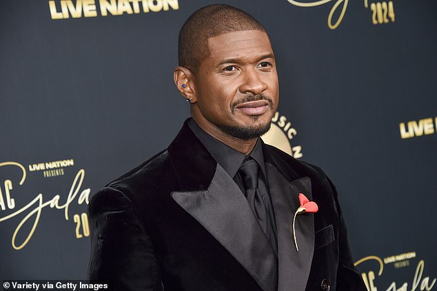 Usher — full name: Usher Raymond IV — added an extra touch of class with a slim rectangular-faced wristwatch with a black leather band, and he stood out thanks to small rectangular sapphire earrings