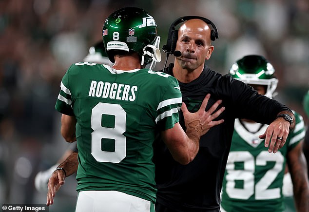 Saleh came on a little too strong in the second quarter as his hug was refused by Rodgers