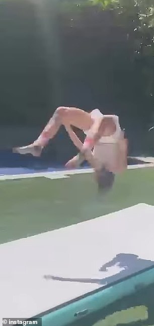 She included footage of the teen showing off her impressive tumbling skills on a training mat in the backyard of their Los Angeles home