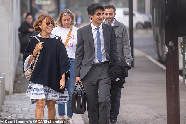 Gisele Pelicot, flanked by her lawyer Stephane Babonneau, arrives at the courtroom on September 20