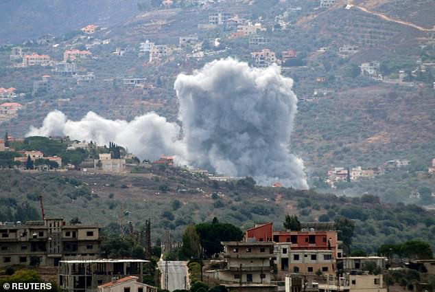 Smoke rises from the southern Lebanese village of Kfar Kila, amid ongoing cross-border hostilities between Hezbollah and Israeli forces, as pictured from Marjayoun, near the border with Israel, September 20, 2024