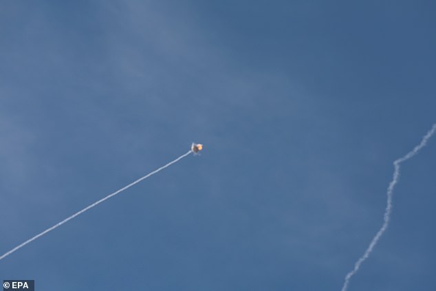 Israel's Iron Dome air defense system intercepts a projectile fired from southern Lebanon over Upper Galilee, northern Israel, 20 September 2024