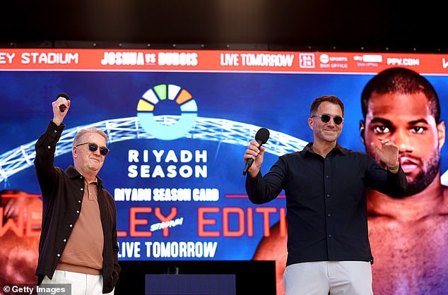 Promoters Frank Warren (left) and Eddie Hearn (right) both appeared in good spirits at the weigh in