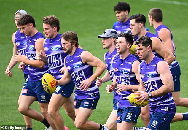 The Cats players were shocked to see the coach collapse in front of them while preparing for their preliminary final against the Brisbane Lions