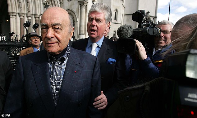 Mohamed Al Fayed (left) with Michael Cole (second left), leave the High Court in London in 2007