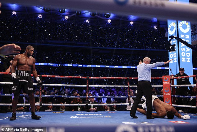 Dubois watched on as Joshua struggled to get back to his feet and the bout was waved off