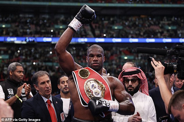 Dubois celebrated with his IBF heavyweight title in front of 96,000 fans at Wembley stadium