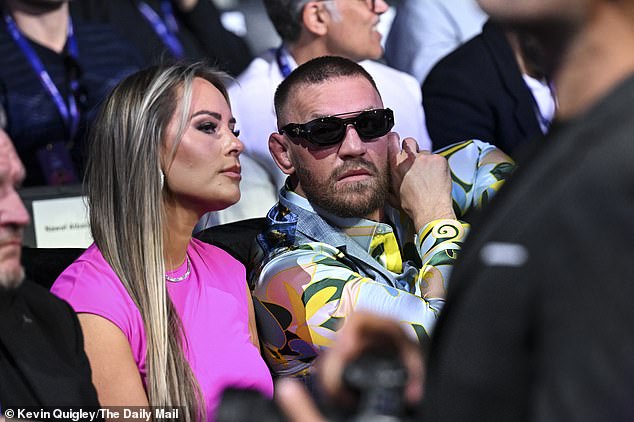 Irishman McGregor was sat next to his wife Dee Devlin among a Wembley crowd of 96,000