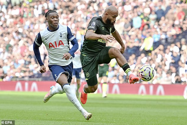 Mbeumo (right) scored the wonderstrike to leave Spurs fans and players 'shellshocked'