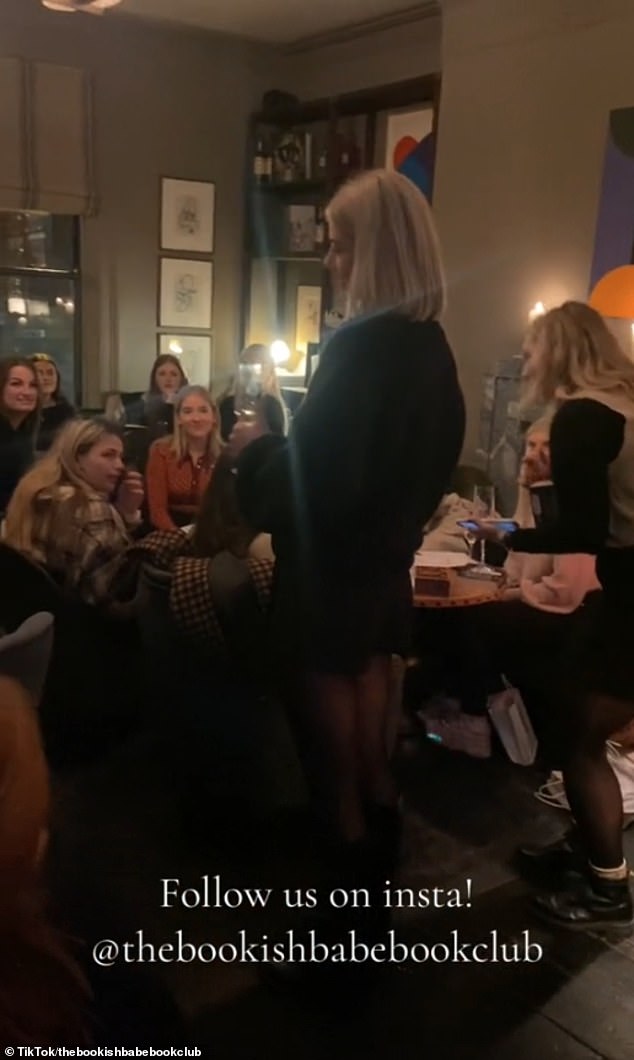 A book's popularity on TikTok can now be make-or-break for how many sales it achieves (pictured: An author speaks during The Bookish Babe Book Club event)