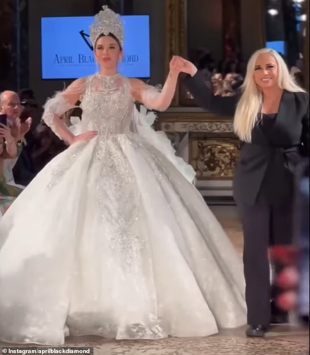 On Sunday, she made a dramatic re-entrance into the modelling world, donning a dramatic wedding dress designed by fashion designer April Black Diamond