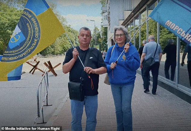 Kompaniiets (right) had spent two years searching for evidence her linguist son was alive after he vanished in the April 2022 fall of the Illich steel plant in Mariupol