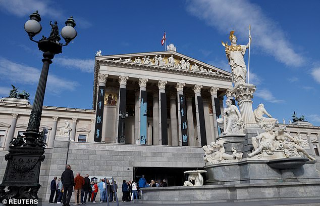 Visitors queue up to enter the Parliament building in Vienna, Austria, September 23, 2024