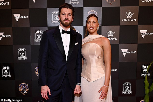 Amanda Dillon raised eyebrows after she declared: 'I would like to see Marcus Bontempelli [win the Brownlow], but I've been told he's maybe not in the mix' (pictured, Bontempelli at the medal count with partner Neila Brennan)