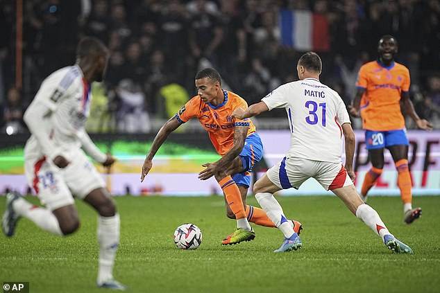 The forward was spotted sporting the brand's gear during Marseille's win over Lille at the weekend