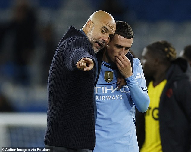 Guardiola used his hands to point and gesture as he dished out tactical advice to Foden