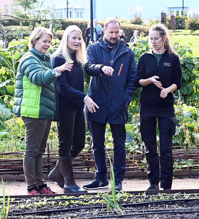 The couple were shown around the farm and looked at the vegetable patches