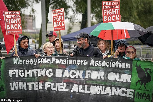 Protesters take part in a demonstration outside the Labour Party Conference against the party's withdrawal of the winter fuel allowance