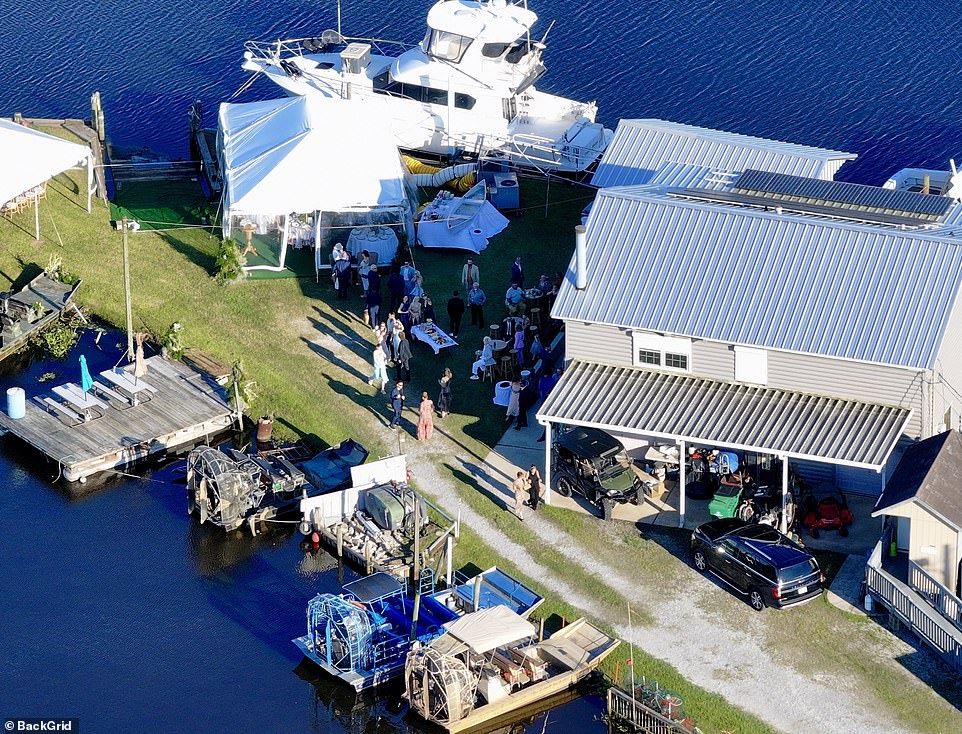 A slew of swamp boats were docked near the wedding venue as well as a gorgeous white yacht