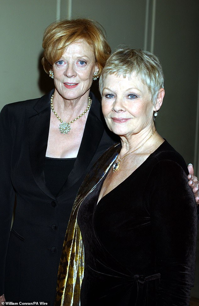 Dame Maggie Smith and Dame Judi Dench arriving at the Theatre Royal Haymarket in London on December 9, 2001