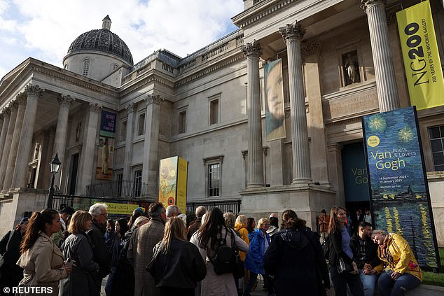 People stand outside The National Gallery following Just Stop Oil activists throwing soup at Vincent van Gogh's Sunflowers this afternoon