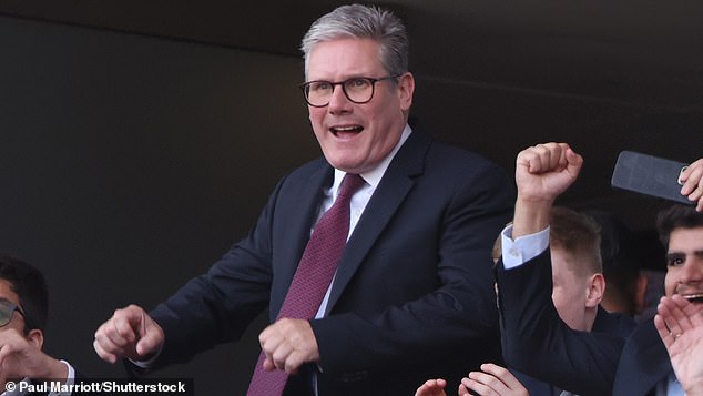 The Prime Minister enjoying the match as Arsenal host Wolverhampton Wanderers last month