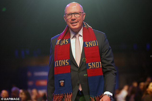 Opposition Leader Peter Dutton was decked out in a Lions scarf, (pictured) making no secret of who he is barracking for at the MCG