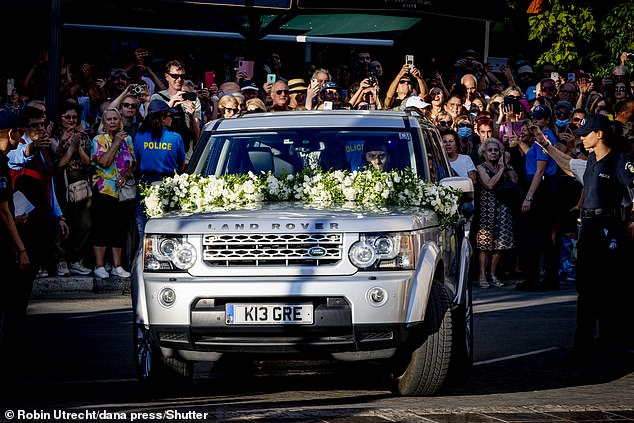 Love is in the air as Princess Theodora arrives to the cathedral in a land rover flooded with a gorgeous floral display