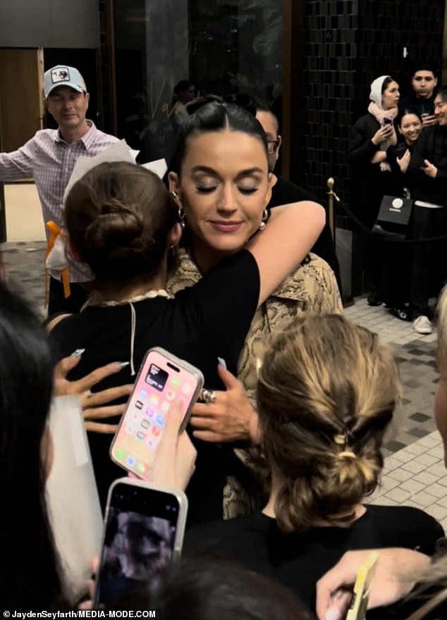 The I Kissed A Girl hitmaker was seen sweetly hugging one young fan during one sweet moment as crowds gathered outside her hotel