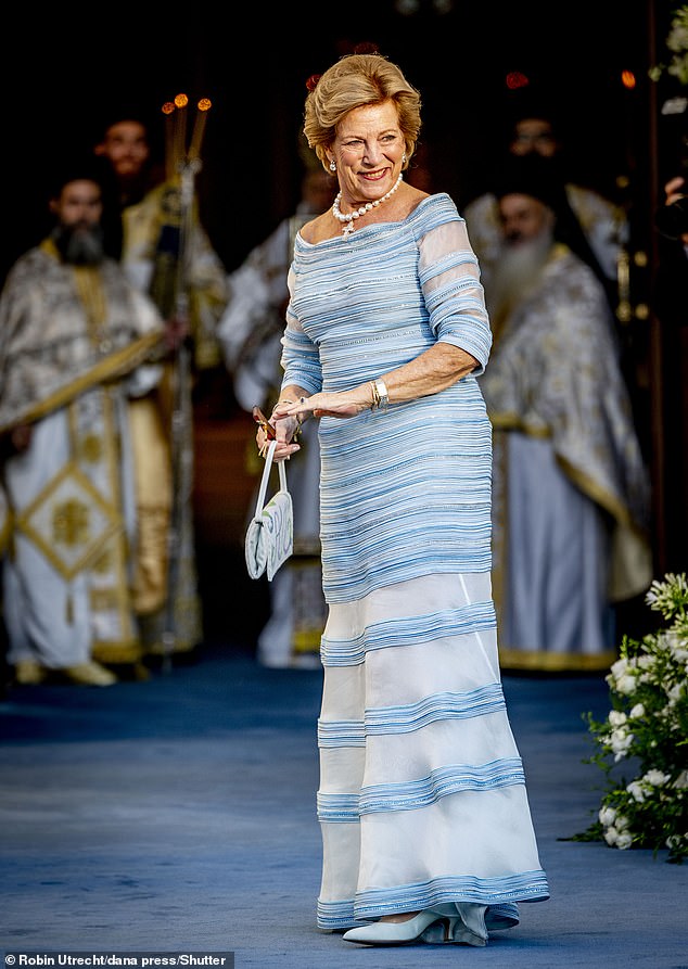 The mother of the bride, Queen Anne-Marie (pictured), looked stunning in a sky-blue gown