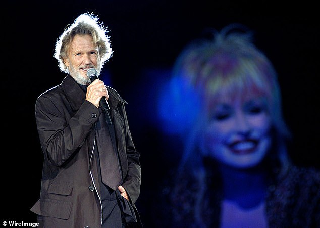 In 1982, the duo teamed up with Willie Nelson and Brenda Lee and released a compilation album called The Winning Hand; Kris seen speaking as Dolly looks at the Country Music Awards in 2003