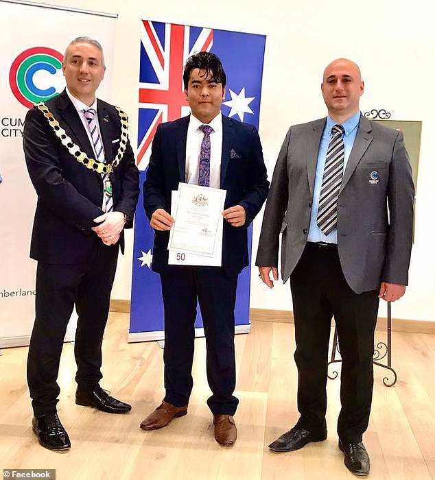 Rahimi is pictured receiving his Australian citizenship in 2020