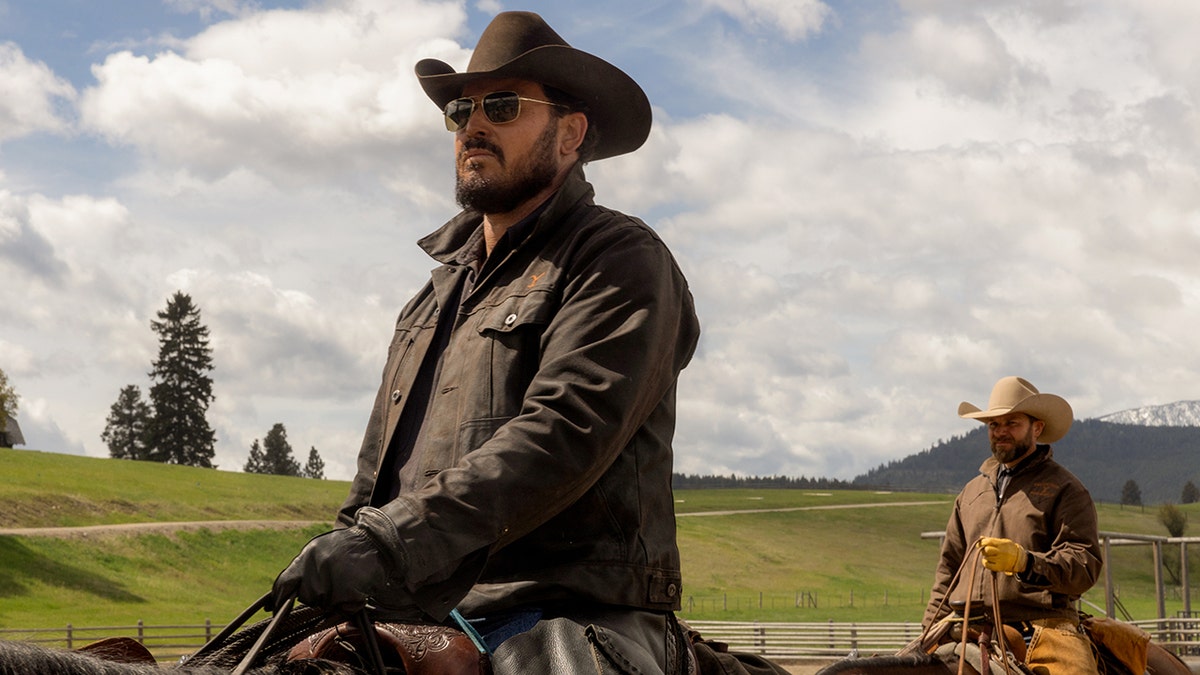 Cole Hauser riding a horse in Montana as Rip Wheeler