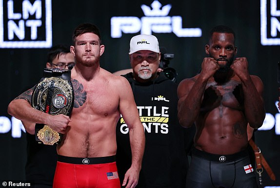 Mixed Martial Arts - Professional Fighters League Fight Night - Saudi Arabia - Weigh-In - Riyadh, Saudi Arabia - October 18, 2024 Johnny Eblen and Fabian Edwards pose during the weigh-in before their Bellator Middleweight World Title fight REUTERS/Hamad I Mohammed