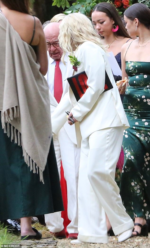 Pictured is Charlotte's grandfather Rupert Murdoch, 92, who whose wealth is estimated at $31billion, at her wedding