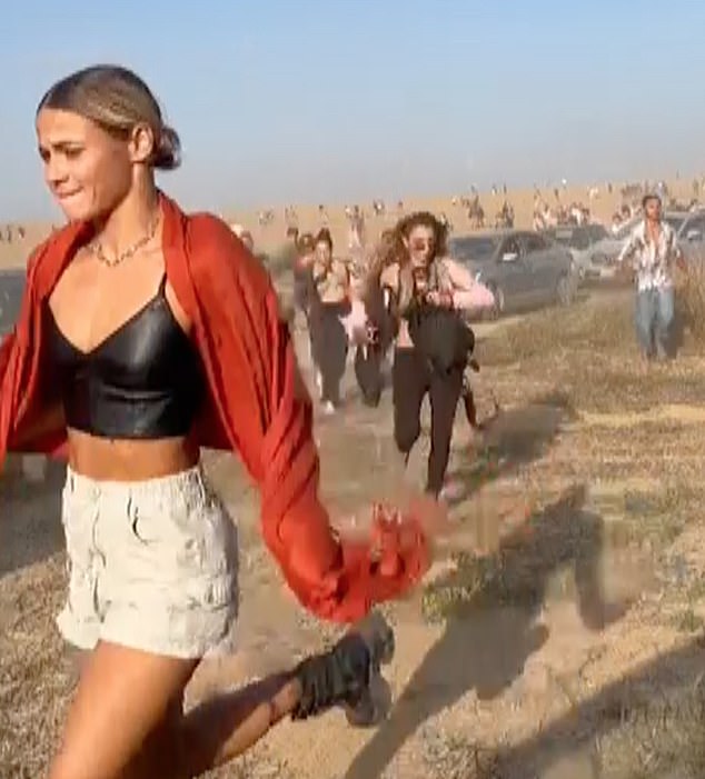 Festivalgoer Vlada Patapov (left) is seen fleeing the site of the Nova festival massacre on October 7, where Hamas gunmen opened fire on revellers, killing hundreds