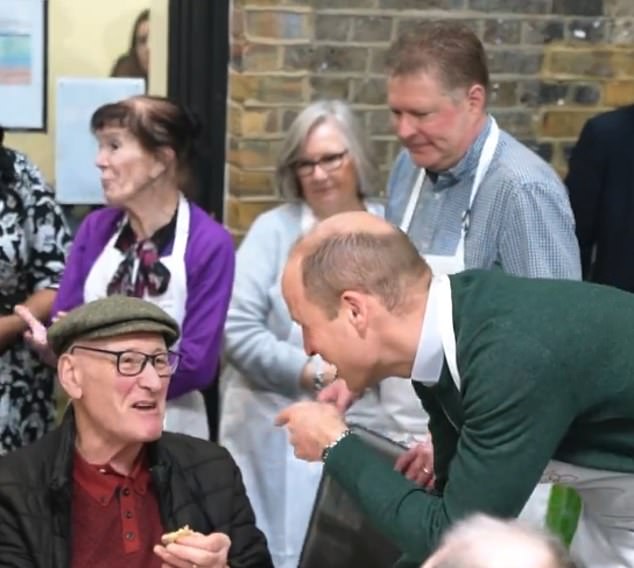 The Prince of Wales appeared to share a joke with one gentleman who had been invited to the Christmas party