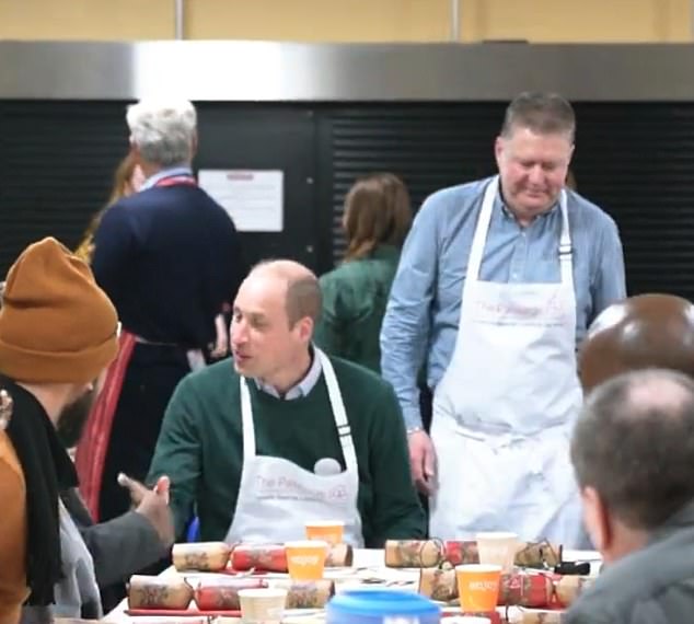 Royal father-of-three William sat down to eat with people at the charity after he had spent time preparing the meal