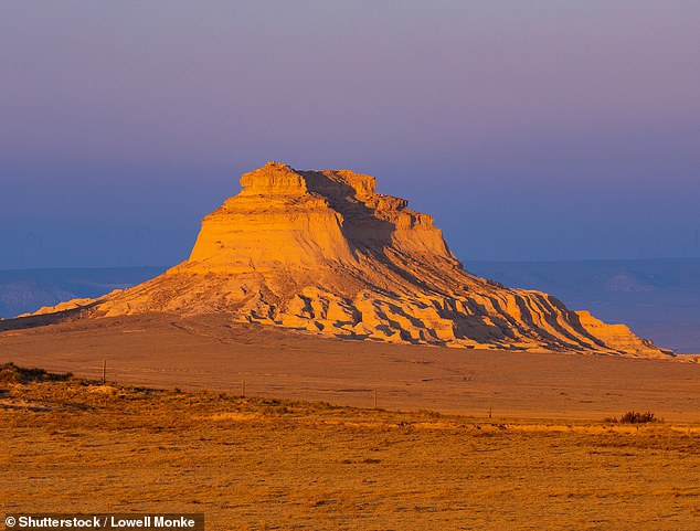 One of the buttes is seen just before sunset